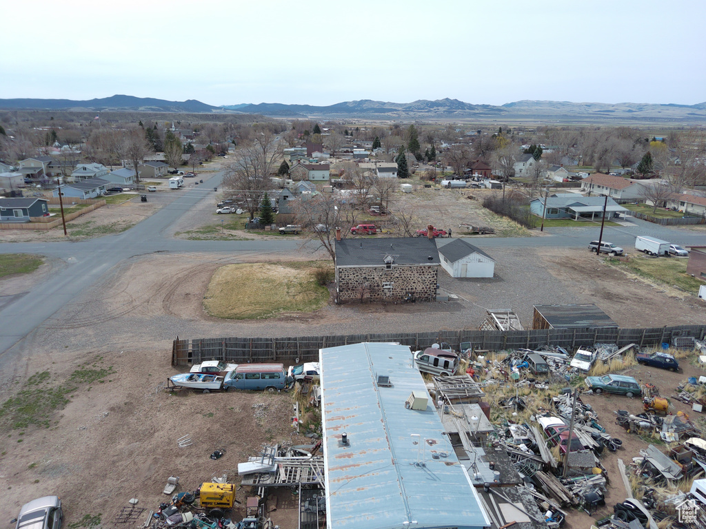 Birds eye view of property featuring a residential view and a mountain view