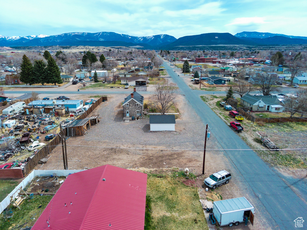 Birds eye view of property with a mountain view