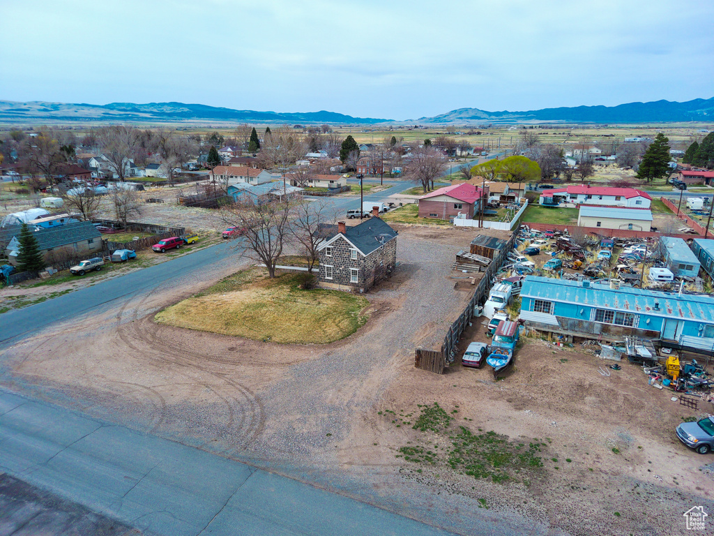 Birds eye view of property with a mountain view