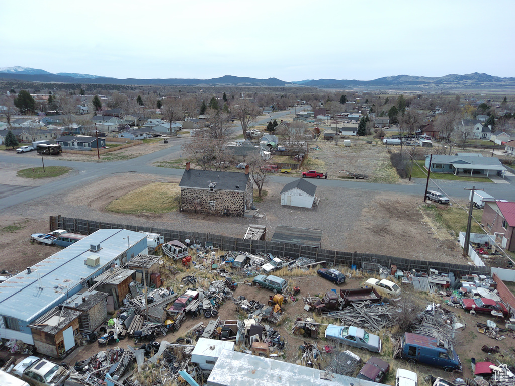 Drone / aerial view with a mountain view and a residential view