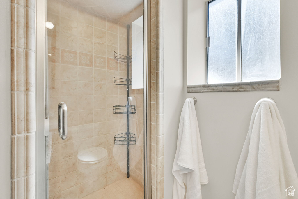 Bathroom featuring a stall shower
