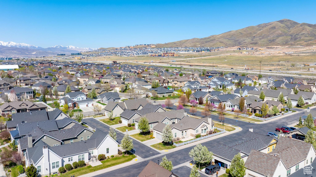 Drone / aerial view featuring a mountain view and a residential view