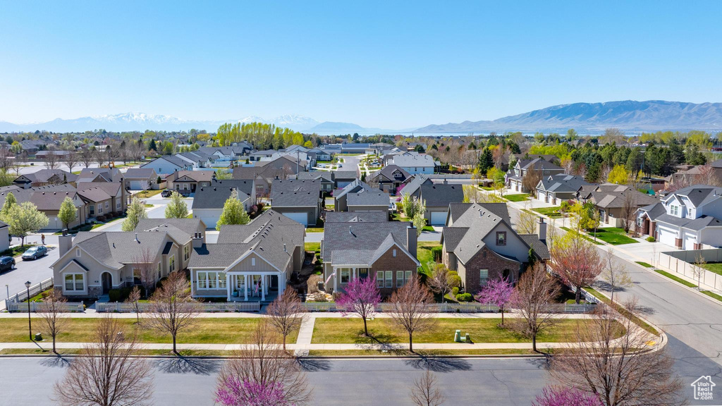 Birds eye view of property featuring a mountain view and a residential view