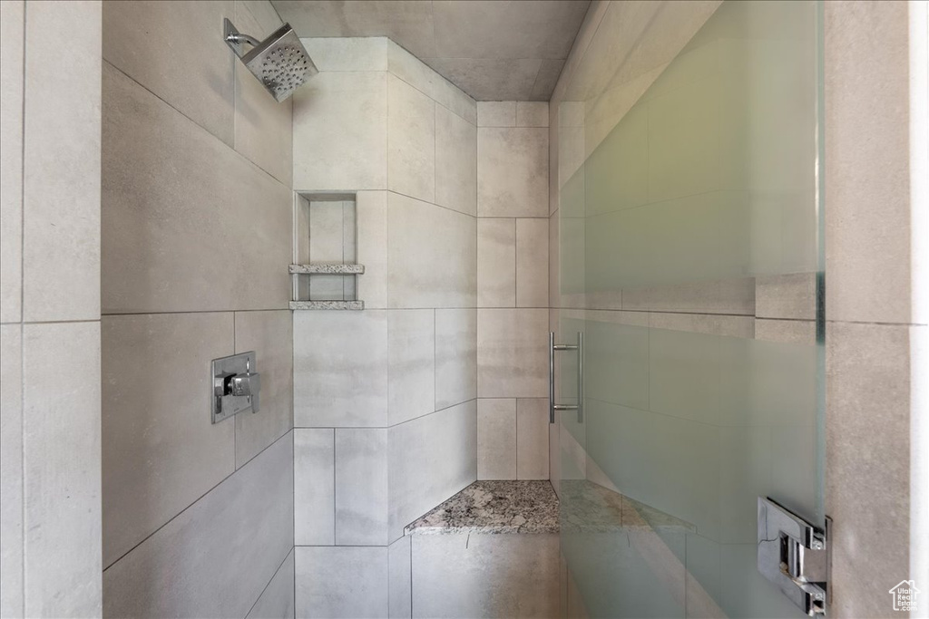 Full bathroom with a shower stall
