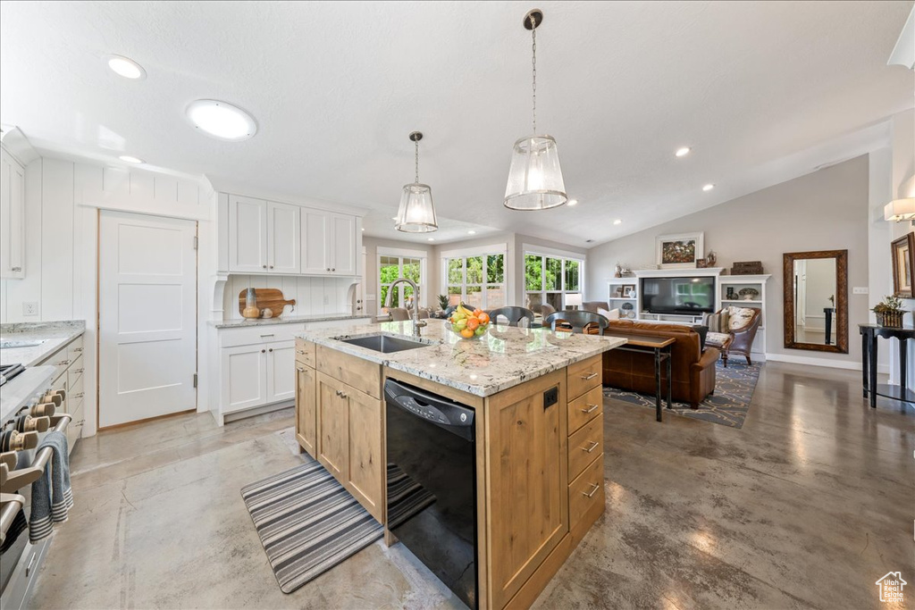 Kitchen featuring concrete floors, dishwasher, a sink, an island with sink, and stainless steel range with gas cooktop
