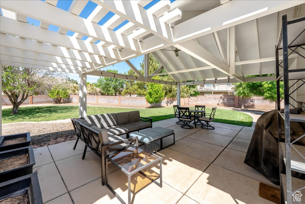 View of patio / terrace featuring a fenced backyard, outdoor lounge area, outdoor dining space, and a pergola
