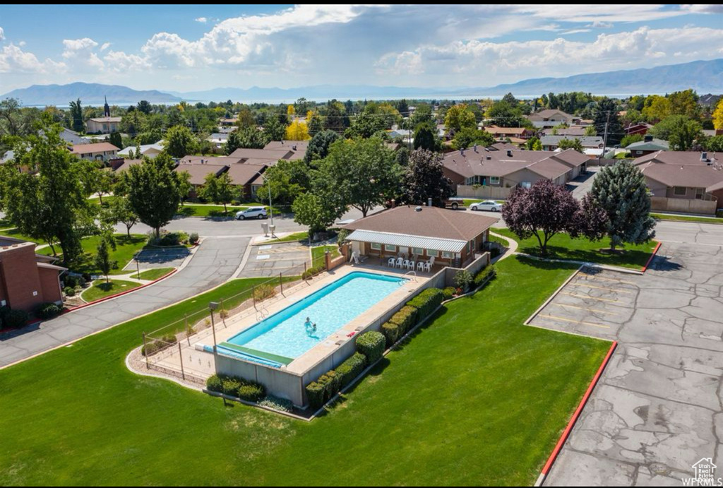 Aerial view featuring a mountain view and a residential view