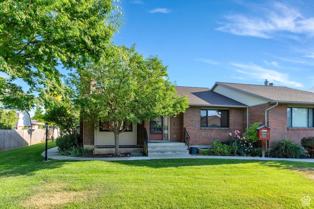 View of front of home with brick siding