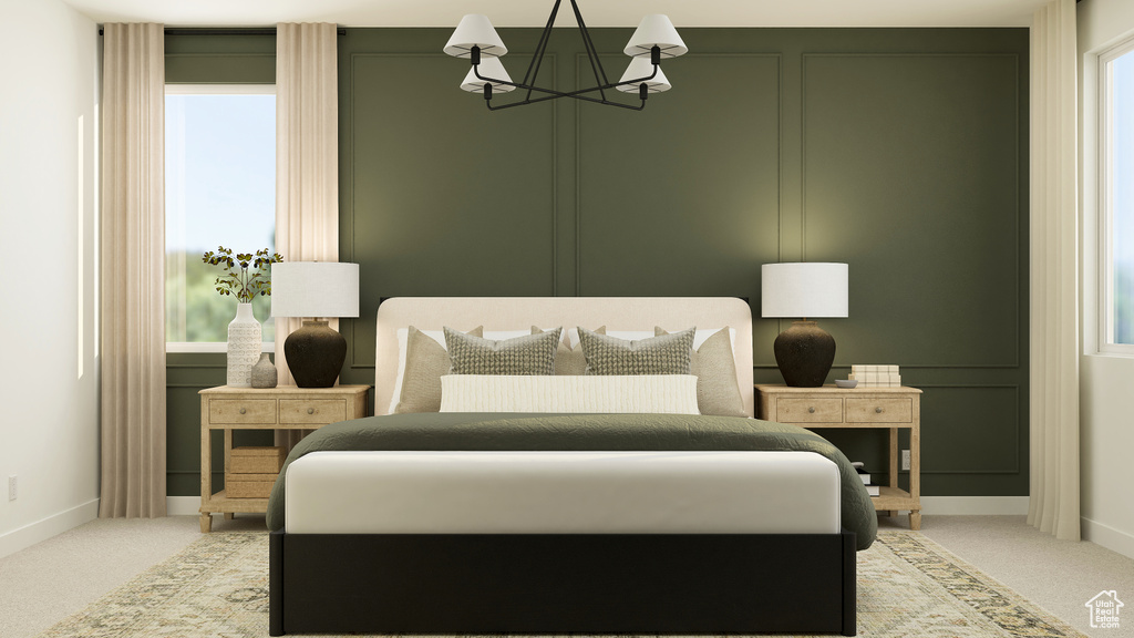 Bedroom featuring light colored carpet, a chandelier, and baseboards