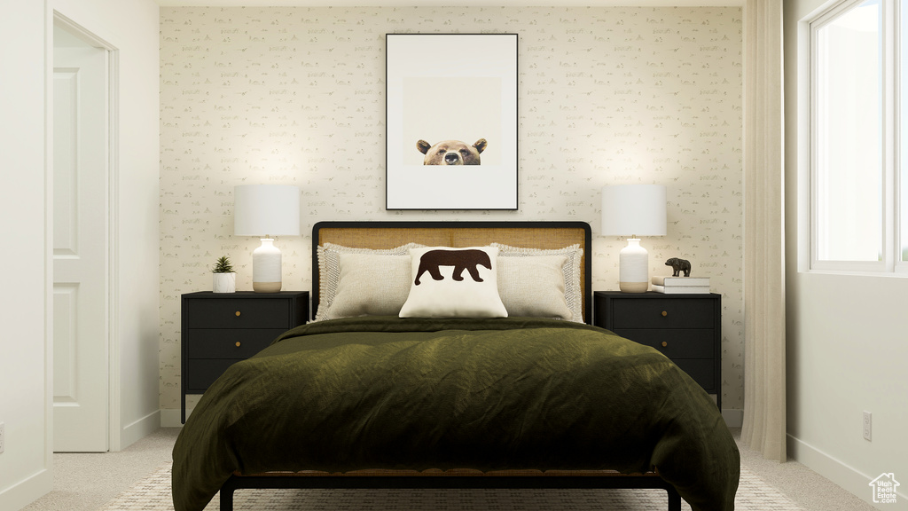 Carpeted bedroom with baseboards and wallpapered walls