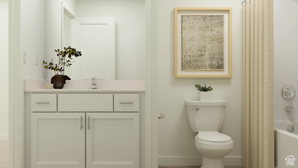 Full bathroom with toilet, vanity, baseboards, and shower / bath combination with curtain