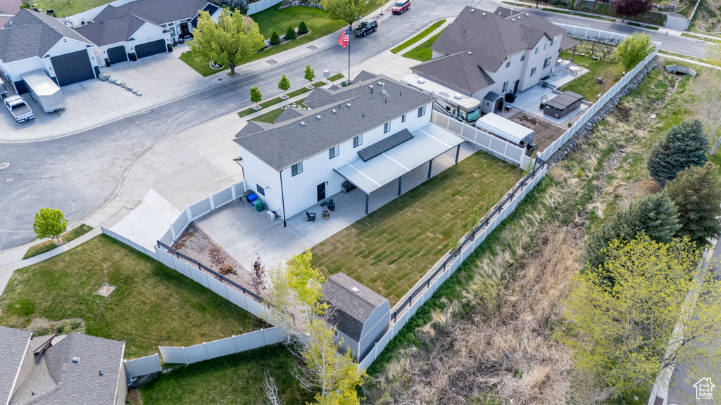 Birds eye view of property with a residential view