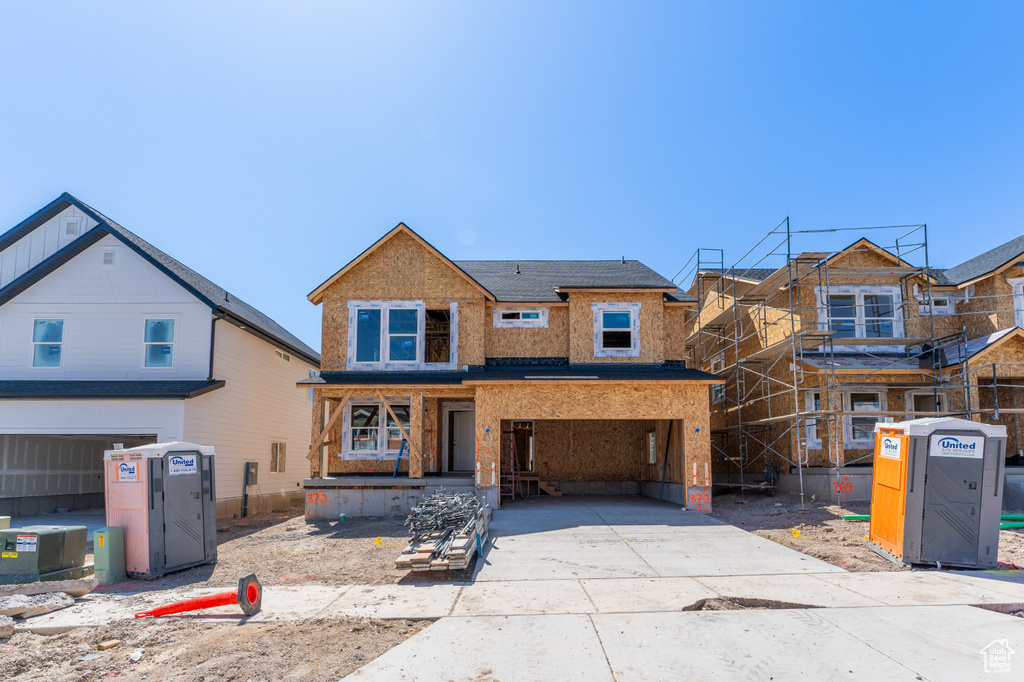 Property under construction with a porch