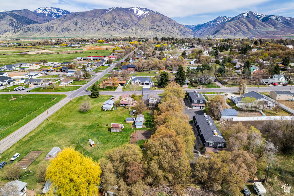 Birds eye view of property featuring a residential view and a mountain view