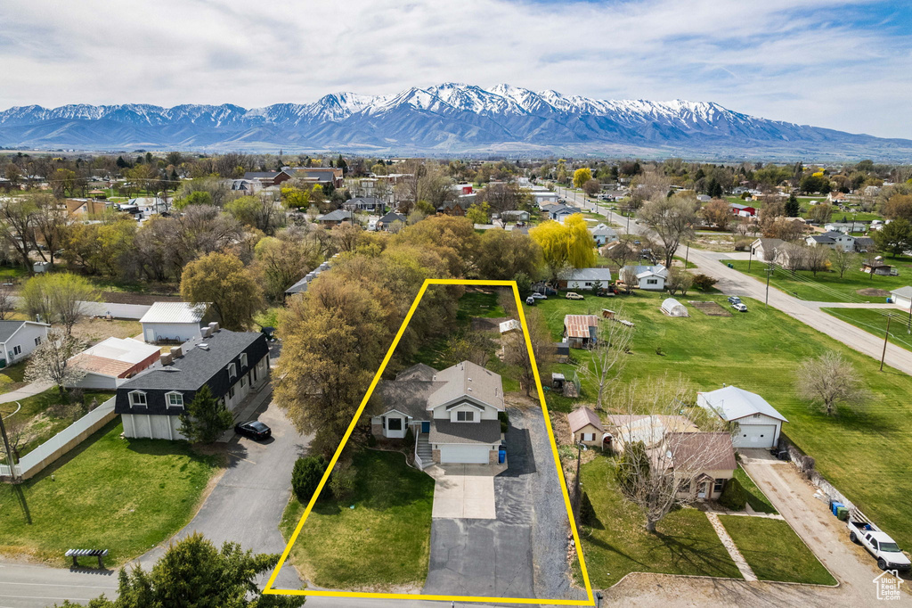Birds eye view of property featuring a residential view and a mountain view