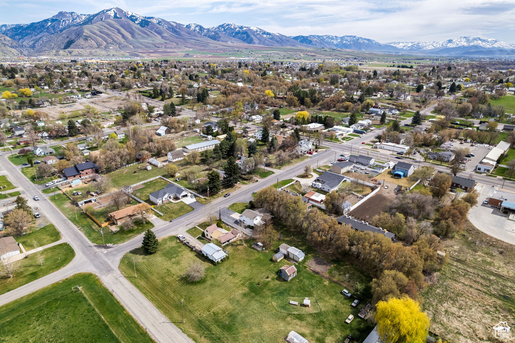 Drone / aerial view featuring a residential view and a mountain view