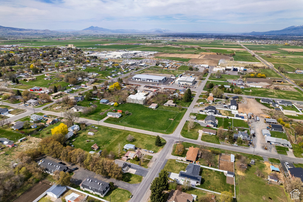 Birds eye view of property with a mountain view