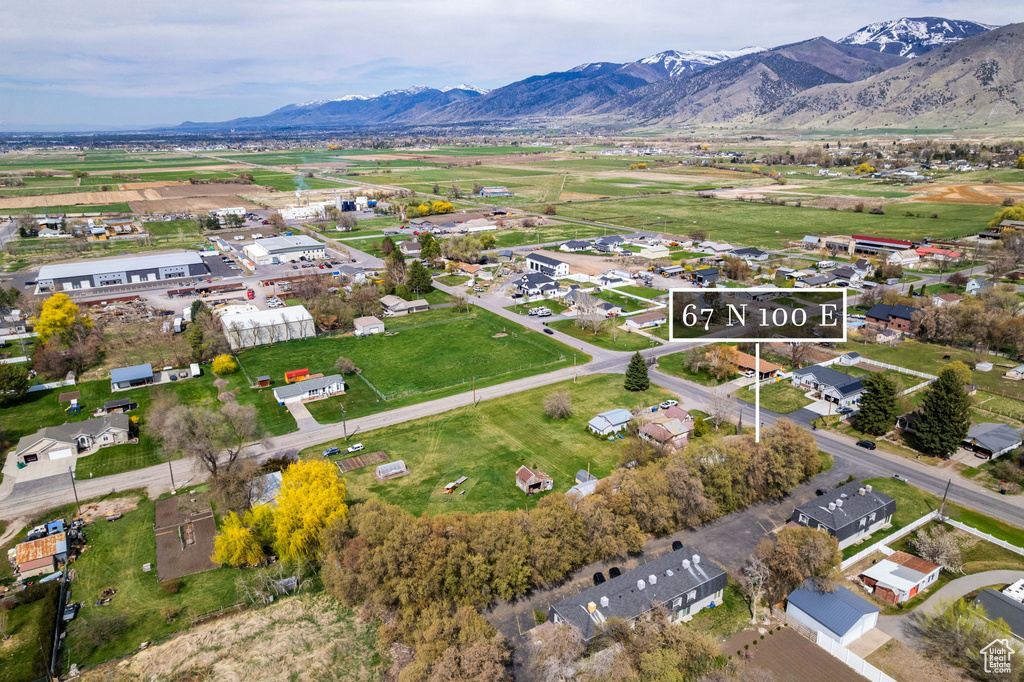 Birds eye view of property with a residential view and a mountain view