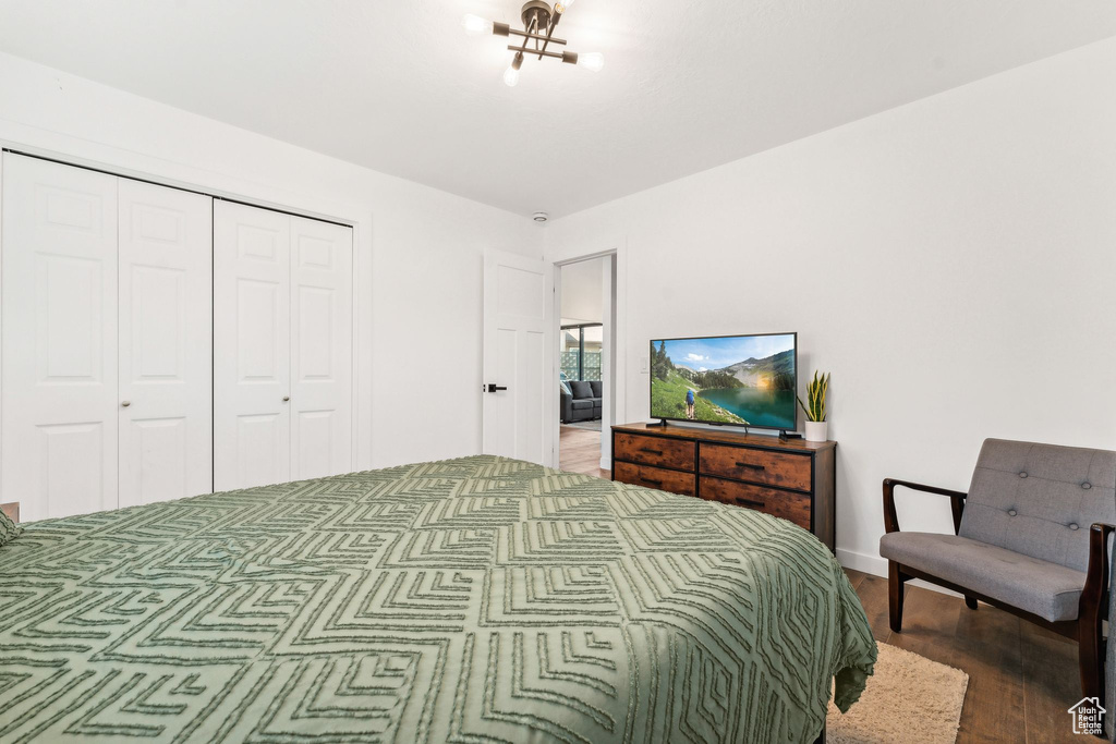 Bedroom featuring a closet and wood finished floors