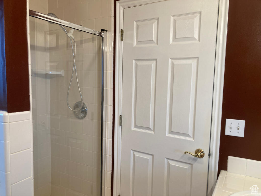 Bathroom with a stall shower
