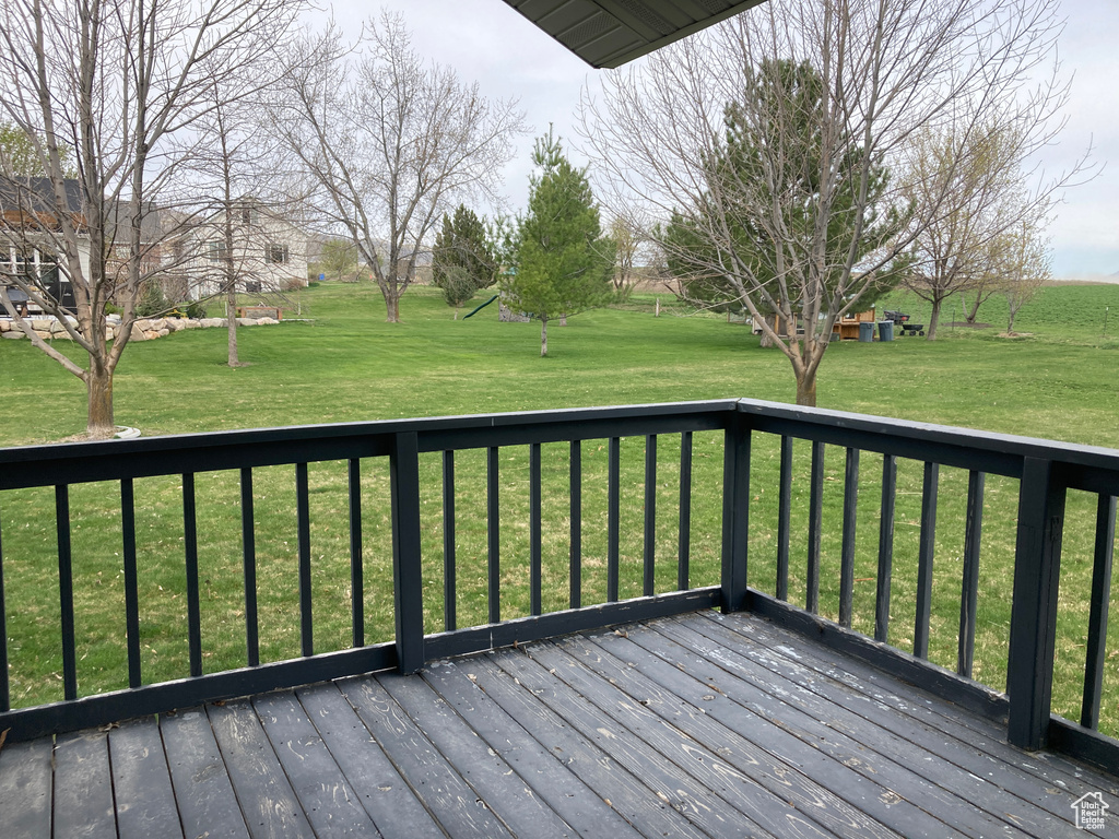 Wooden deck with a yard