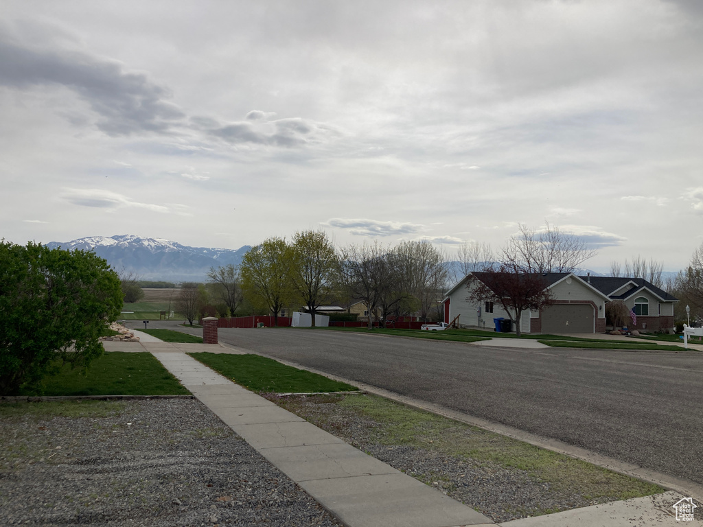 View of road with a mountain view and sidewalks
