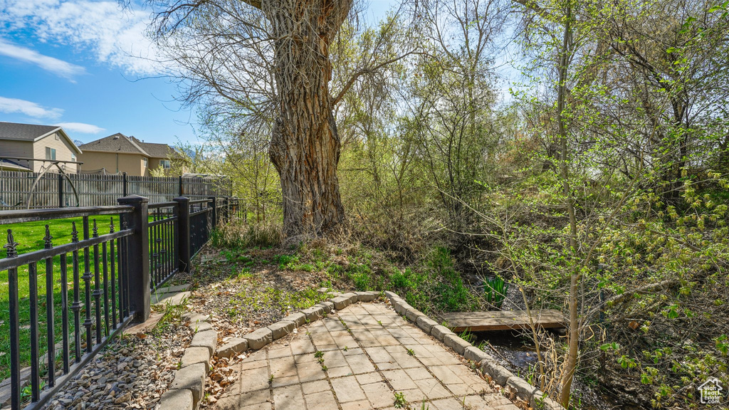 View of yard with fence