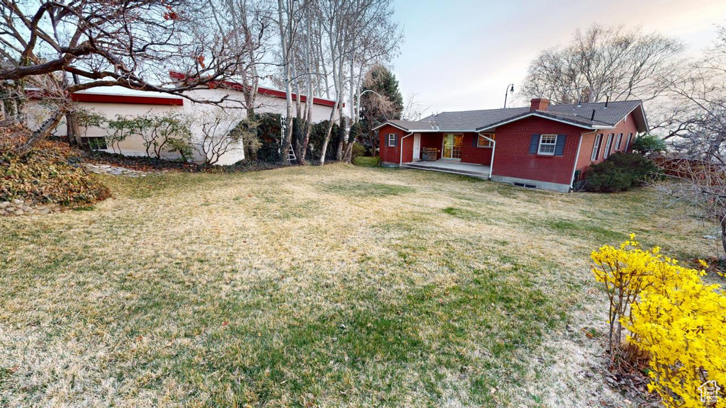 View of yard featuring a porch
