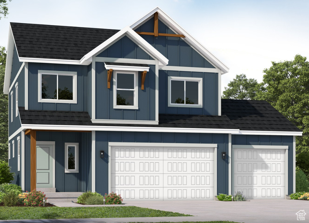 View of front facade with concrete driveway, an attached garage, board and batten siding, and a shingled roof