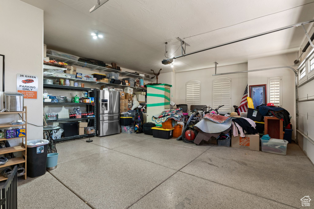 Garage with stainless steel fridge