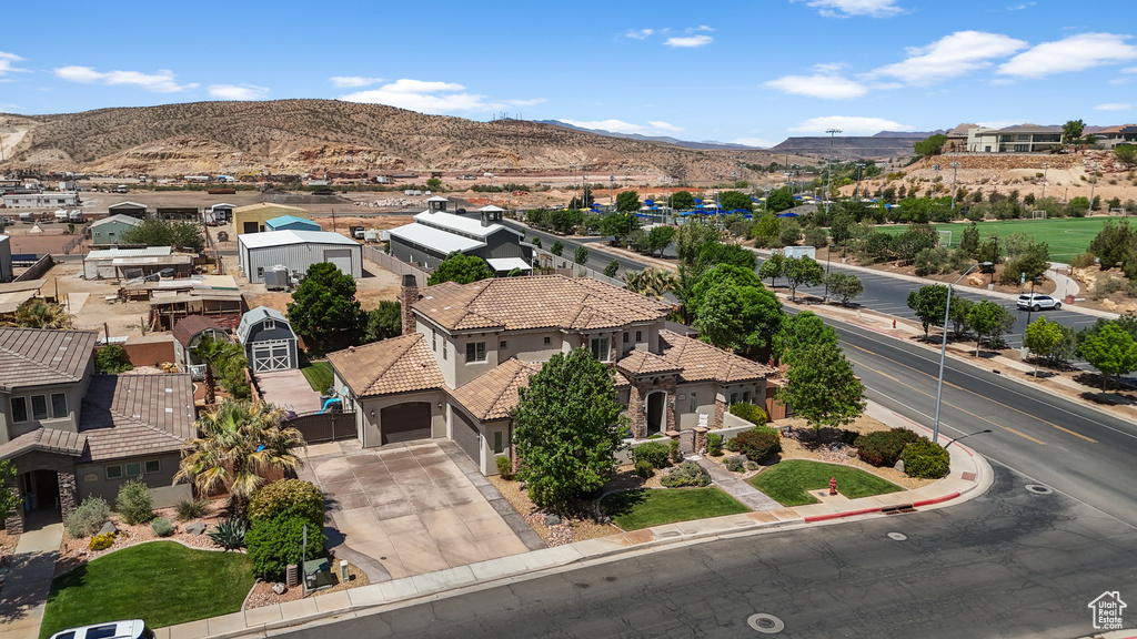 Aerial view of residential area with a mountain backdrop