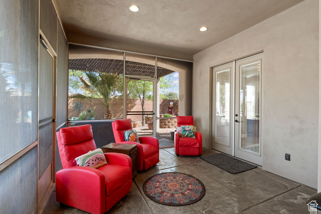Sunroom / solarium featuring french doors
