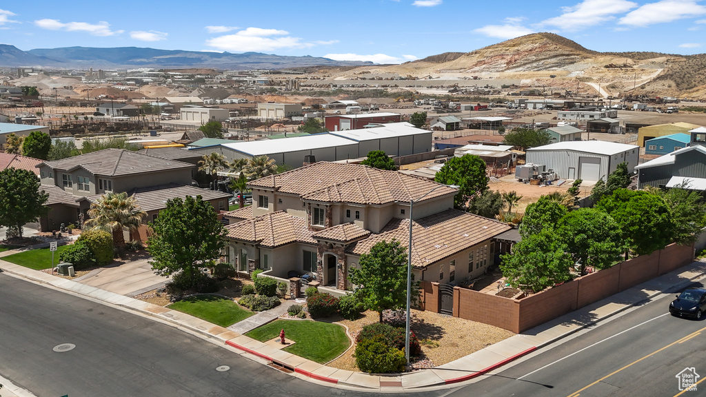 Aerial perspective of suburban area with a mountain backdrop