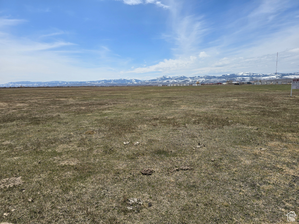 View of yard featuring a mountain view and a rural view