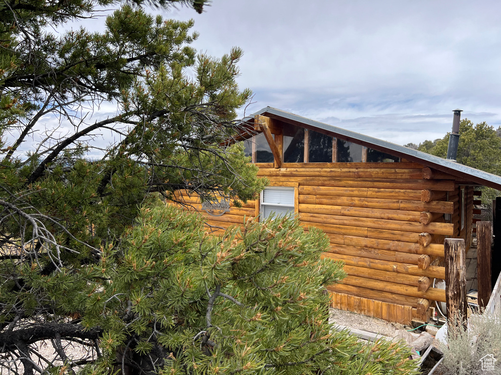 View of side of property with log exterior