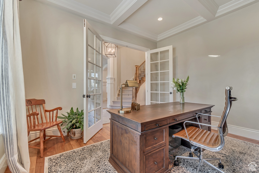 Office with beamed ceiling, ornamental molding, french doors, light wood finished floors, and baseboards