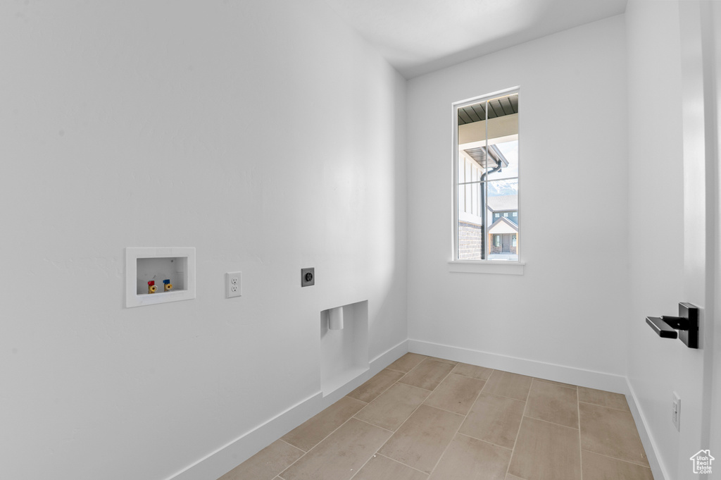Laundry area with electric dryer hookup and hookup for a washing machine
