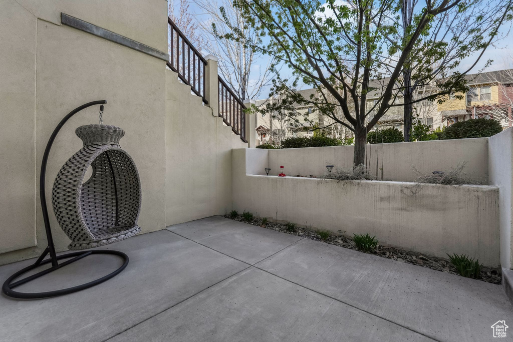 View of patio / terrace featuring fence