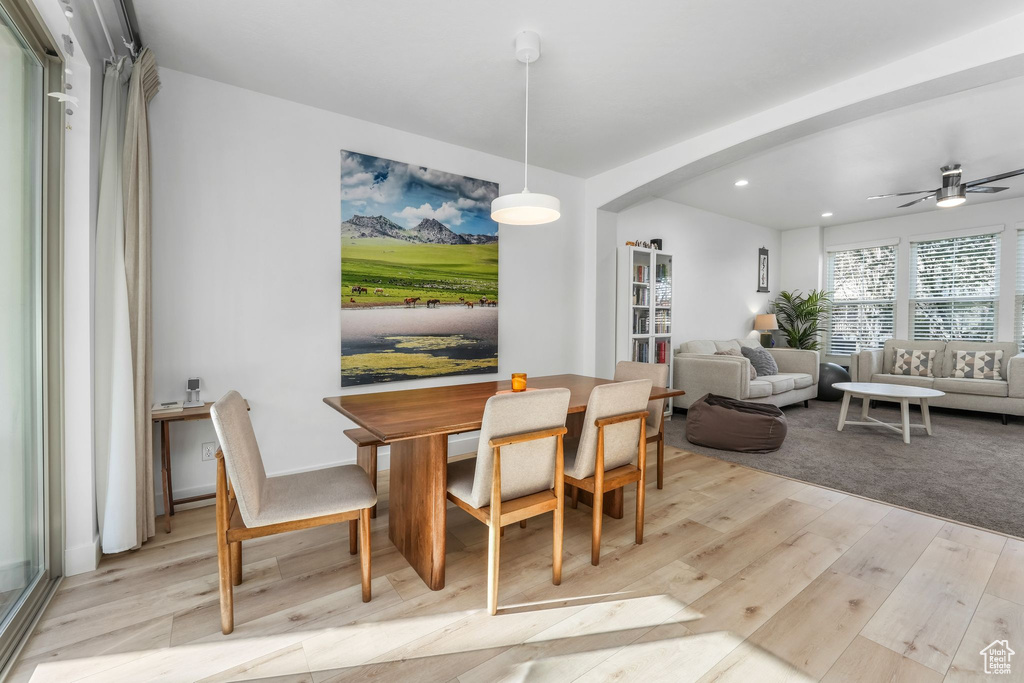 Dining room featuring ceiling fan, light wood finished floors, and recessed lighting