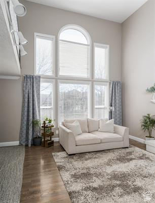Living room featuring baseboards and wood finished floors