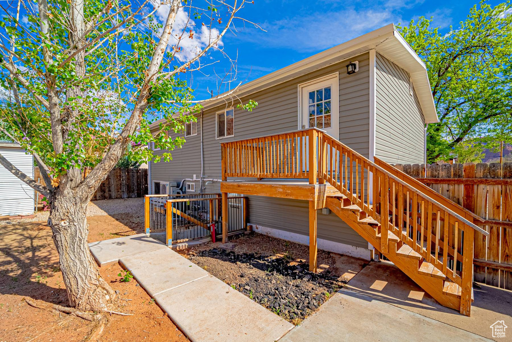 Back of house featuring fence