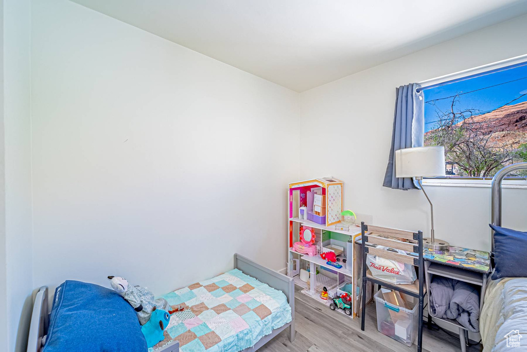 Bedroom featuring wood finished floors