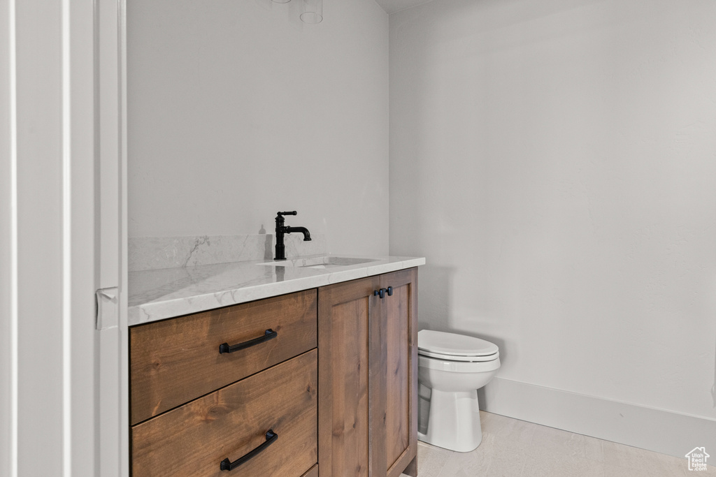 Bathroom featuring toilet and vanity