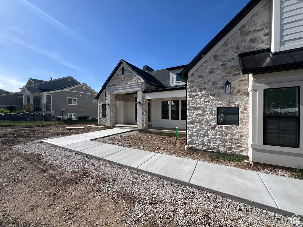 View of front of home with stone siding