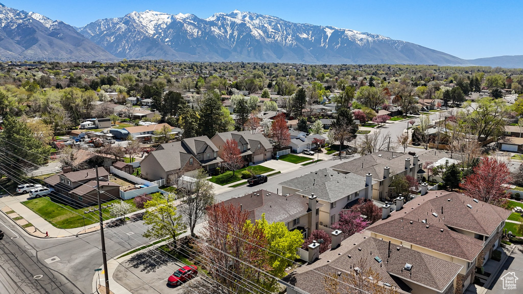 Drone / aerial view featuring a residential view and a mountain view