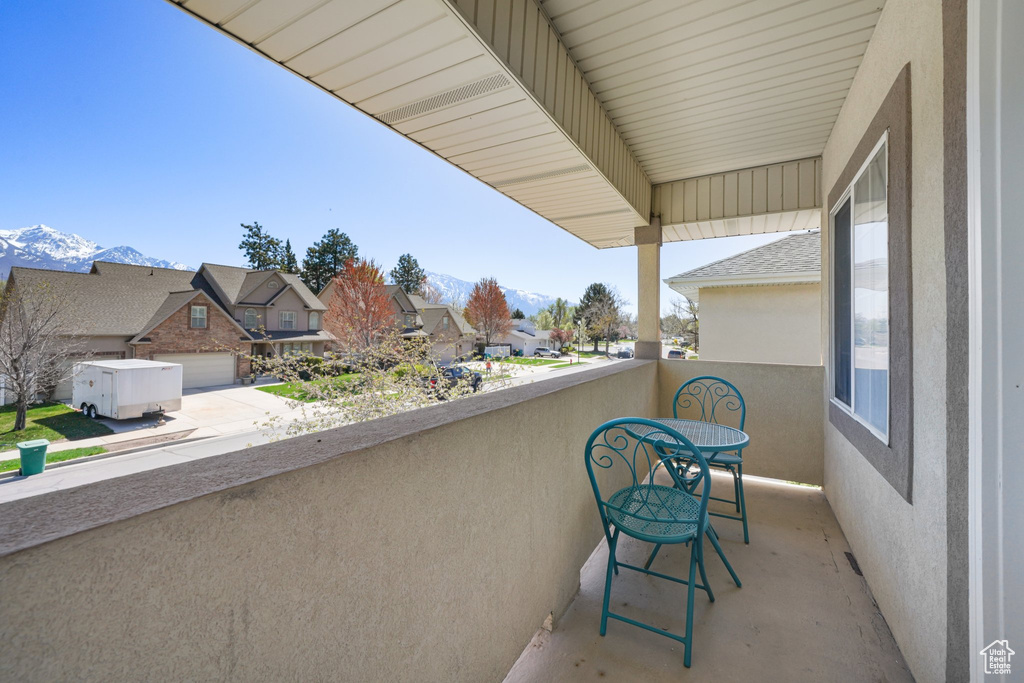 Balcony with a mountain view and a residential view