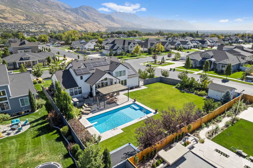 Drone / aerial view with a mountain view and a residential view