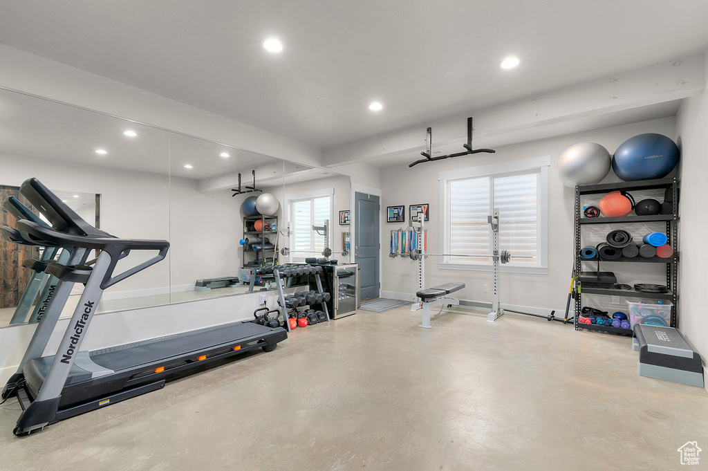 Exercise area featuring baseboards and recessed lighting