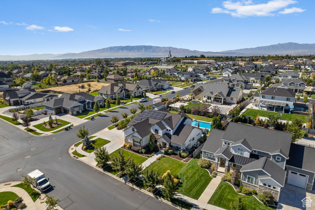 Drone / aerial view with a mountain view and a residential view