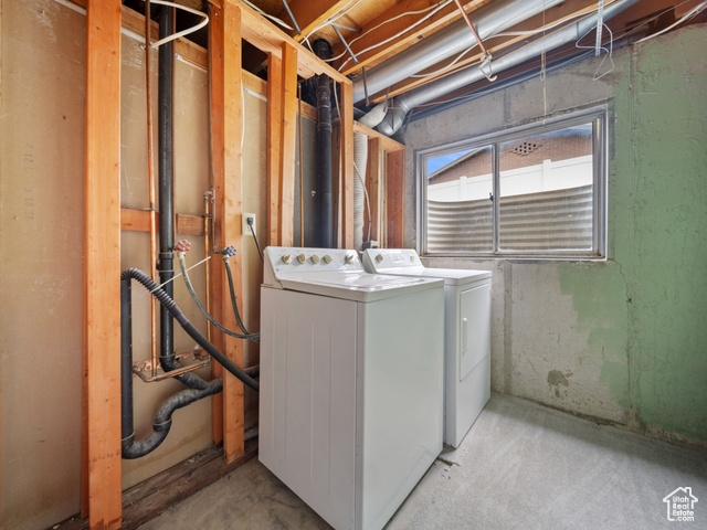 Laundry room with washing machine and dryer and laundry area